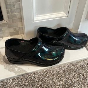 Sanita Clogs. Metallic iridescent black and greenish hues.  Euro size 37